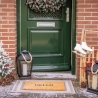 Tapete de entrada em fibra de coco com inscrição "Hello" Catálogo