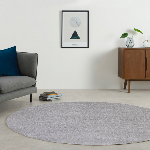 Entrada moderna com carpete redondo cinza na sala de estar Casacolora CCTOPLA