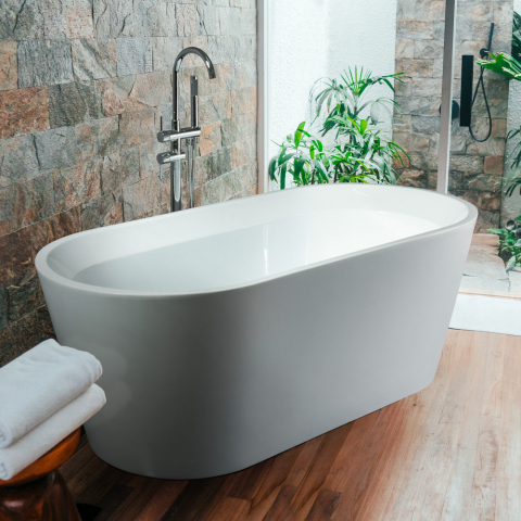 Banheira independente com design oval em resina Arbe
